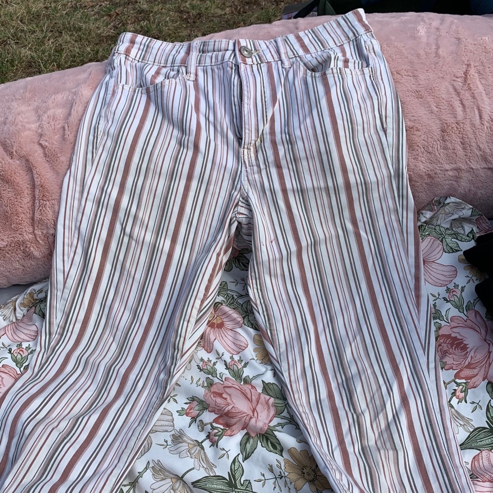 Pin stripe American eagle pants with small stain